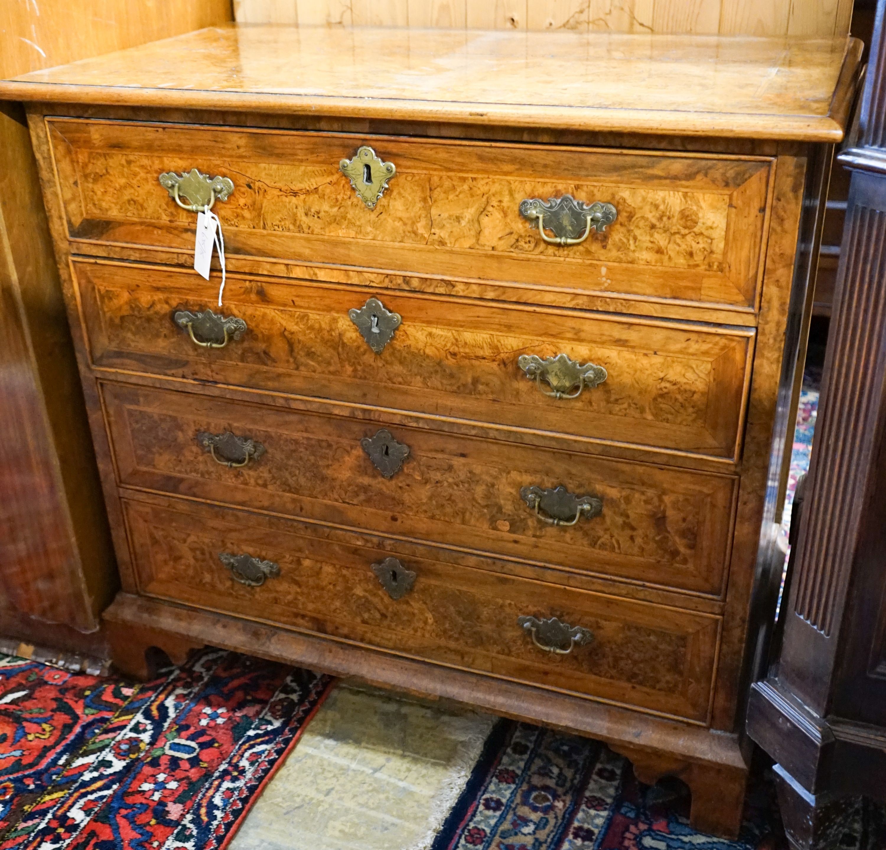 An 18th century burr walnut, banded and inlaid chest, possibly Dutch